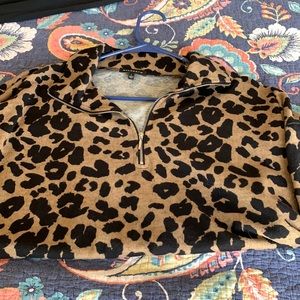 Cheetah pullover size L